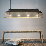Riva 4 Light Extra Long Perforated Iron Elongated Pendant - Matt Black/Gold