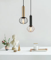 CORAZON: Interior Antique Brass and Matte Black Round Cage Pendant Light