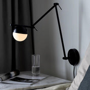 Contina Indoor Wall Light in Black or Brass